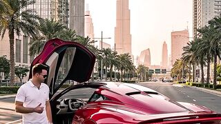 Ruby Red Flying Aston Martin in Dubai