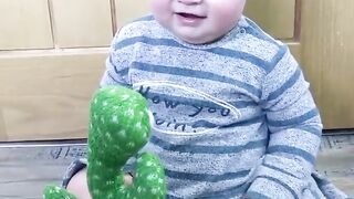 A Cute Baby and Dancing Cactus!