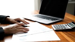 Business Professional Reviewing Financial Data Reports