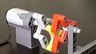 8 mechanical principles in a useless Lego machine (front side)