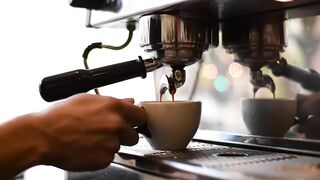 Close-up of Espresso Preparation in a Cafe
