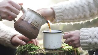 Cozy Outdoor Coffee Pouring in Nature