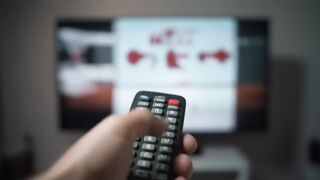 Hand Operating TV Remote Control