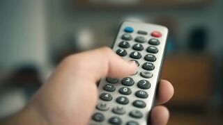 Hand Operating TV Remote Control 3