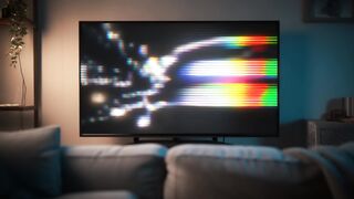 Dark Living Room with Large TV and Sofa