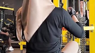 hijab girl builds back muscles