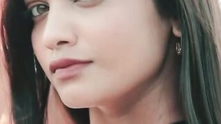 Her expressive eyes reflect warmth, kindness, and a playful spirit,