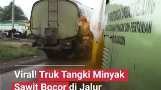 Truk tangki minyak mengalami kebocoran hingga menyiram jalan dan kendaraan yang melintas