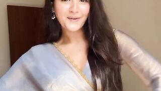 She radiates sweetness with a gentle, caring smile,
