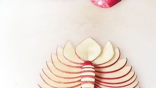 Seni Mengukir Buah Apel Menjadi Bentuk Kupu-Kupu yang Indah