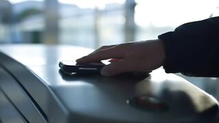 Smartphone on Contactless Scanner with Green Light