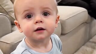 Baby and father making some fun