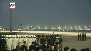 Trump arrives in China for highly anticipated summit with Xi Jinping