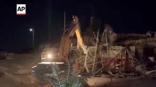 Israel demolishes about 50 Palestinian shops ahead of road project
