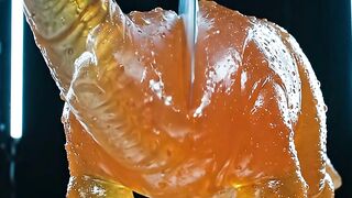 Satisfying Machine Slicing a Gummy Dinosaur