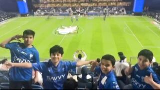 Watch football match in stadium