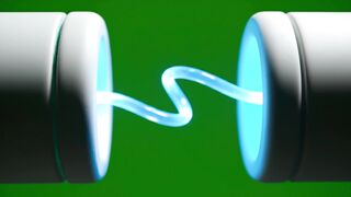 Electric arc discharge between two metal terminals emitting glowing blue plasma energy in a continuous looping motion sequence