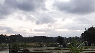 Rural Scenery Under Cloudy Skies