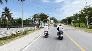 Sunny Motorcycle Ride Through Coastal Roads and Blue Skies in Indonesia