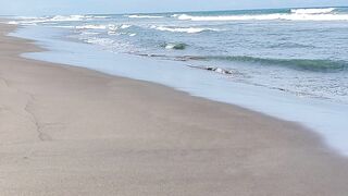 Capturing Precious Family Moments Amidst the Beautiful Ocean Waves.