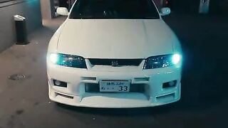 White GTR under city lights
