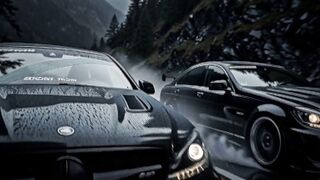 Mercedes C200 cars slowing down on a wet mountain road during heavy rain,