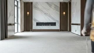 3D Epoxy Floor Renovation with Gold Play Button in a Luxury Room