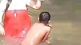 Sacred_public_holy_bathing_at_the_serene_Salinadi_where_devotion,_purity,___tradition_come_together(360p).mp4