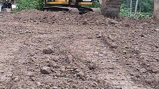 CAT 320D Action Arranging and Tidying Disposal Material to Be Neater