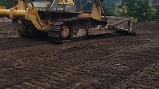 Productivity of KOMATSU D85E-SS Dozer in Leveling and Material Finishing Work at the Disposal Area