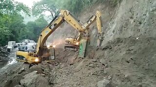 The CAT 320D Breaker Works Maximally to Break Up Solid Soil Layers
