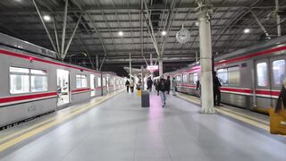 Modern Train Station Platform with Commuters