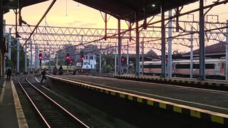 Railway Platform at Sunset with Warm Sky