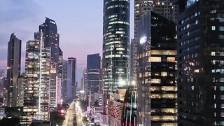 Aerial City View with Traffic at Dusk