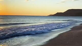 Golden Sunset Over Ocean Shore