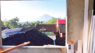 Residential Rooftops Under Clear Blue Sky
