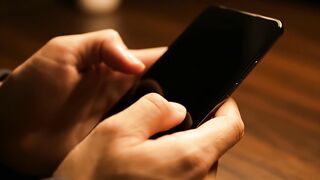 Smartphone screen interaction in close up video motion digital footage