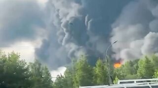 Massive smoke plume rising dramatic