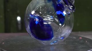 Crushing marble balls with 150 ton Hydraulic Press.
