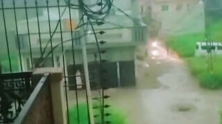 Babies enjoying in rain