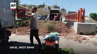 Israeli military closes entrances to West Bank town, disrupting residents' lives