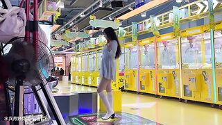 Blue short-skirt dancing machine. Excuse me, miss, your skin is so fair.