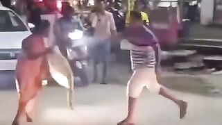 Indian women uses her own poop in a street fight