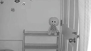 Night Vision View of a Cozy Bedroom with Fan and Doll