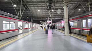 Modern Train Station Platform with Commuters 2
