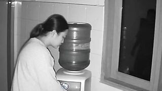 Night CCTV Footage of Home Intruder Stalking Woman in Kitchen