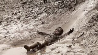 BABY IS ENJOYING SOIL