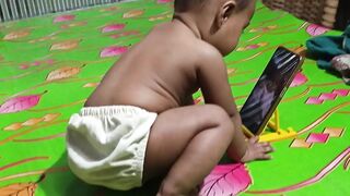 "He is enjoying watching his own video."