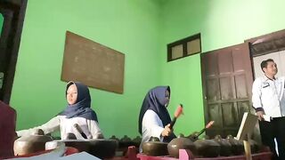 practicing Javanese gamelan karawitan