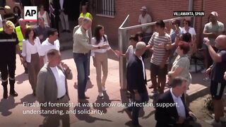 King and queen of Spain meet people displaced by wildfires around Madrid